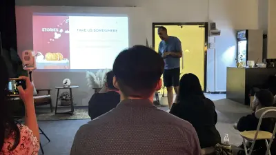 Tim Ramak presenting a slide about how stories take us somewhere during Filmmaking 101 at The A Frame in Guangzhou.