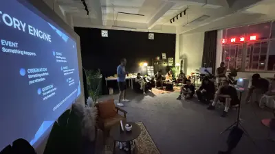 Tim Ramak discussing the story engine with the Guangzhou audience seated around the studio.