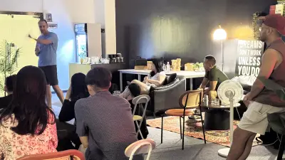 Tim Ramak gesturing during the open group discussion with Guangzhou filmmakers and creatives.