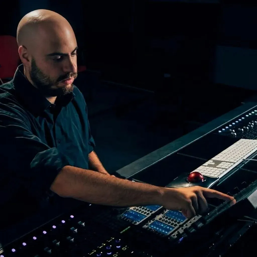 Sound designer Marc Sander Montant working at a professional mixing console
